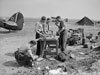 Armourers loading aircraft guns.
