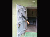 Door with an FM automatic rifle set into the door as added protection.