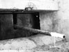 The end of the barrel was threaded and a muzzle break screwed on, this allowed for a higher powered charge. The gas was diverted backwards through the muzzle causing a breaking affect. Allowing a more powerful shell to be used and no real increase in the travel of the barrel. This was a German invention and taken up very quickly by the British in their 25 pounder gun.
    In this picture it is missing?