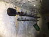 Cleaning rods on a bunker wall.