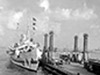 A Red Cross ship tied up the ambulance “Spud” pier head.