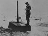 A shell set into the concrete, when a boat hits the wooden stake, a striker plate will hit the shell and it will explode.