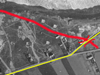 Red is the new road from the port with the minor road re routed over the top. One L401 is behind the white house and the other two on the side of the road cutting.
