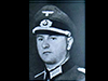 Maj. Werner Pluskat. ( link to Maj Pluskat talking of his experiences on D-day [in German])