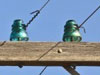 Telephone pole insulators.