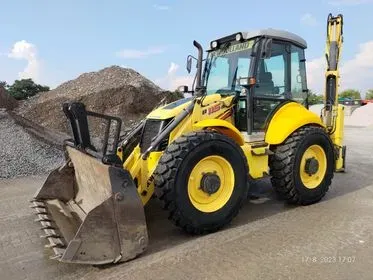 New Holland B115B/ 2008/ 7385 motohours  (1)
