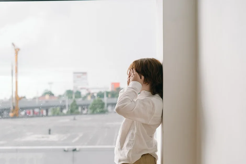 Child cover their face, playing hide & seek