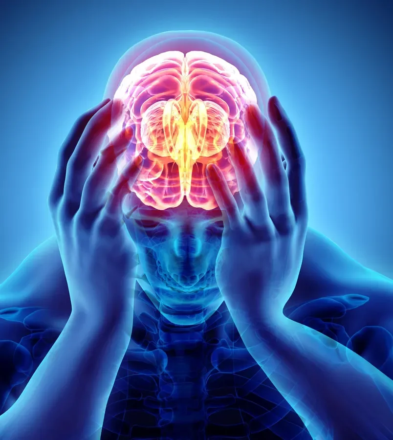 Main holding head in hands with brain pulsating