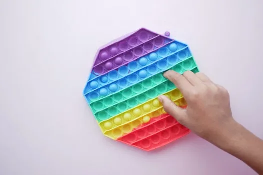 Person using a fidget toy