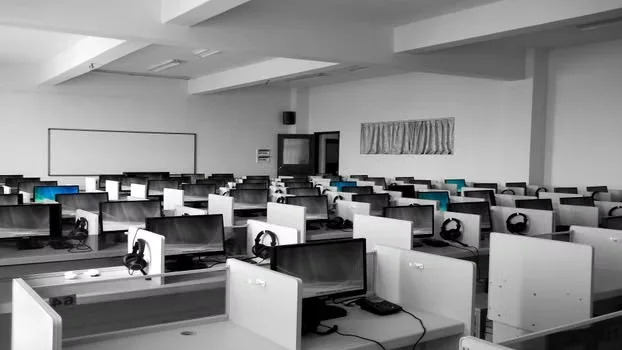 An office space full of empty work stations
