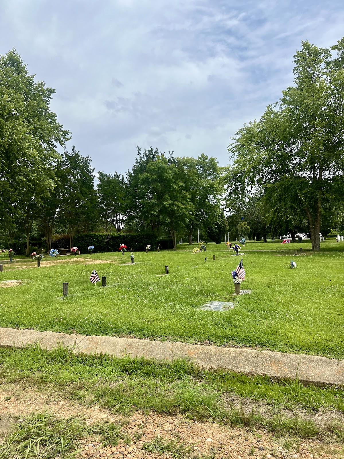 Autumn Woods Memorial Gardens cemetery grounds and headstones
