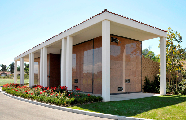 Eternal Hills Mortuary & Crematory at Eternal Hills Memorial Park cemetery grounds and headstones