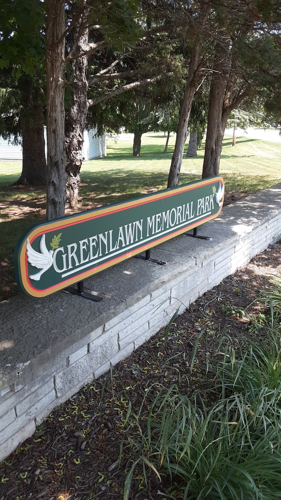 Greenlawn Memorial Park headstone and grounds