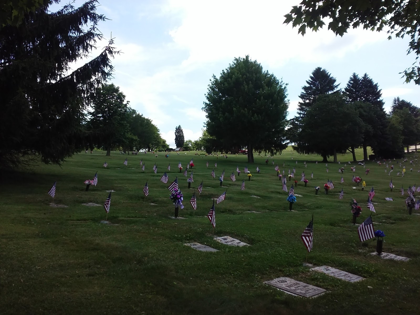 Greenwood Memorial Park headstone and grounds