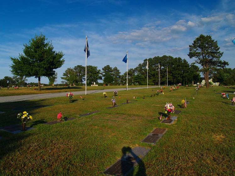 Henlopen Memorial Park cemetery grounds and headstones