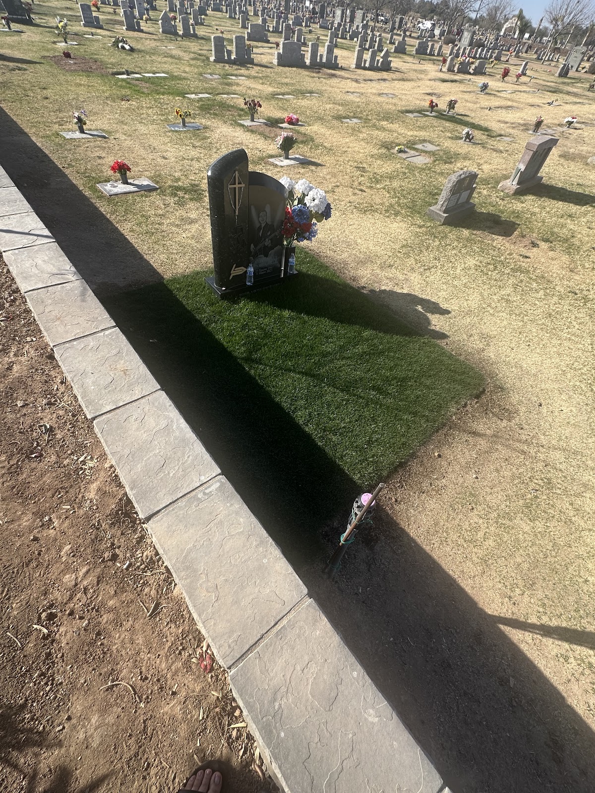 Holy Cross Cemetery headstone and grounds