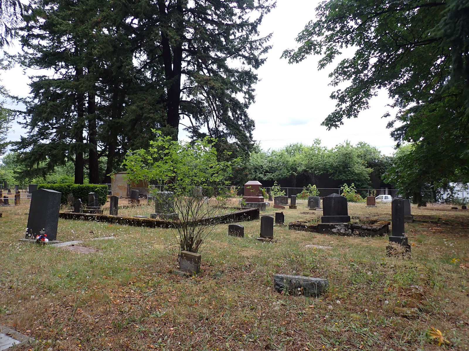 Milwaukie Pioneer Cemetery headstone and grounds