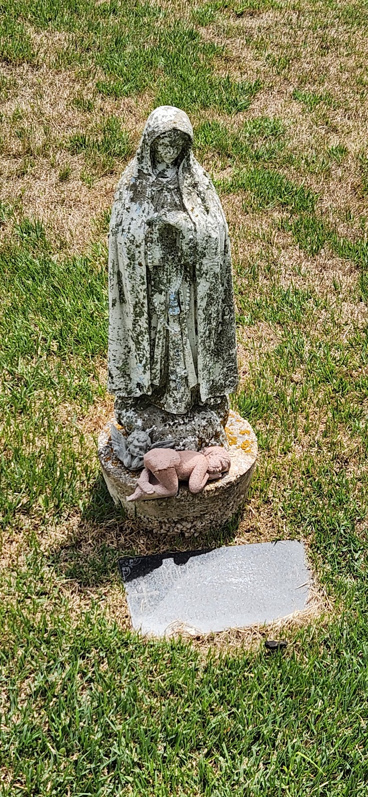 Mount Calvary Cemetery headstone and grounds