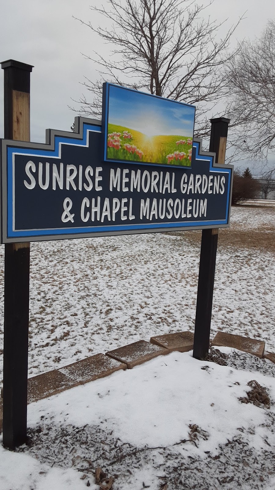 Sunrise Memorial Gardens cemetery grounds and headstones