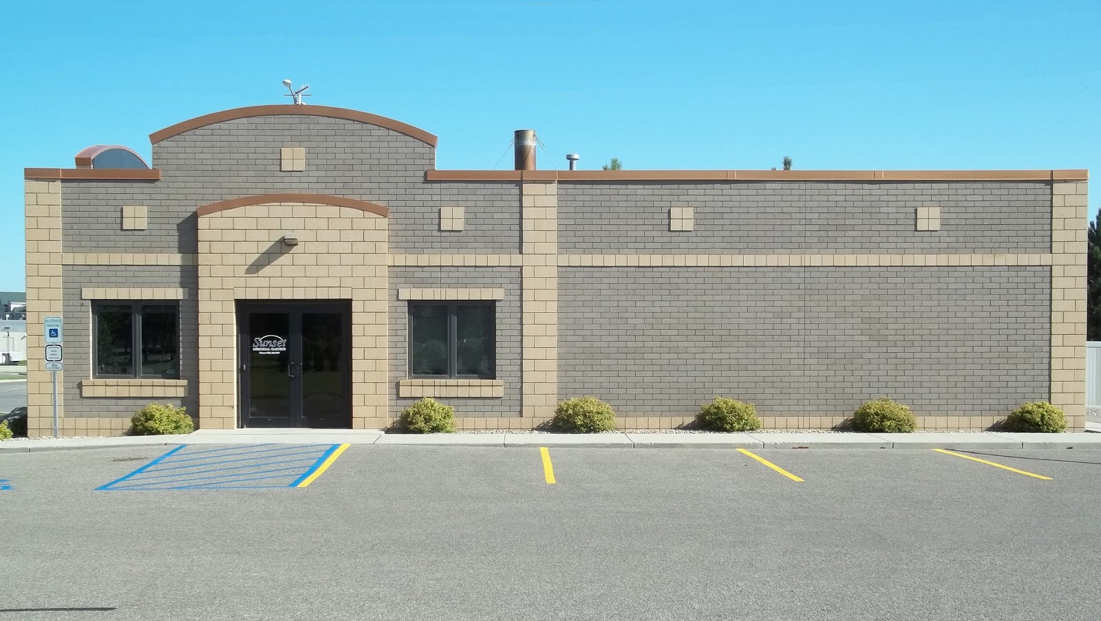 Sunset Memorial Gardens cemetery grounds and headstones