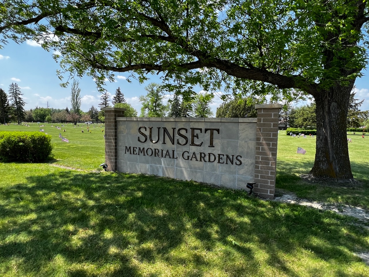 Sunset Memorial Gardens cemetery grounds and headstones