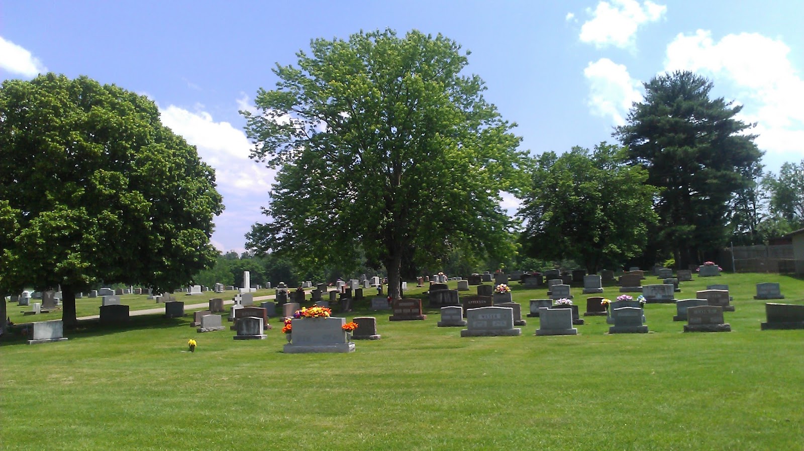 Sunset Memorial Park cemetery grounds and headstones