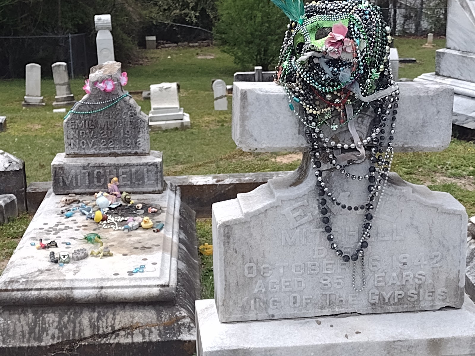 The grave of Kelly Mitchell and her family cemetery grounds and headstones