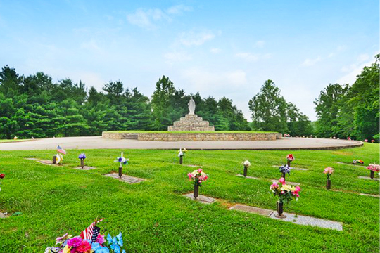 Tyler Mountain Memory Gardens cemetery grounds and headstones