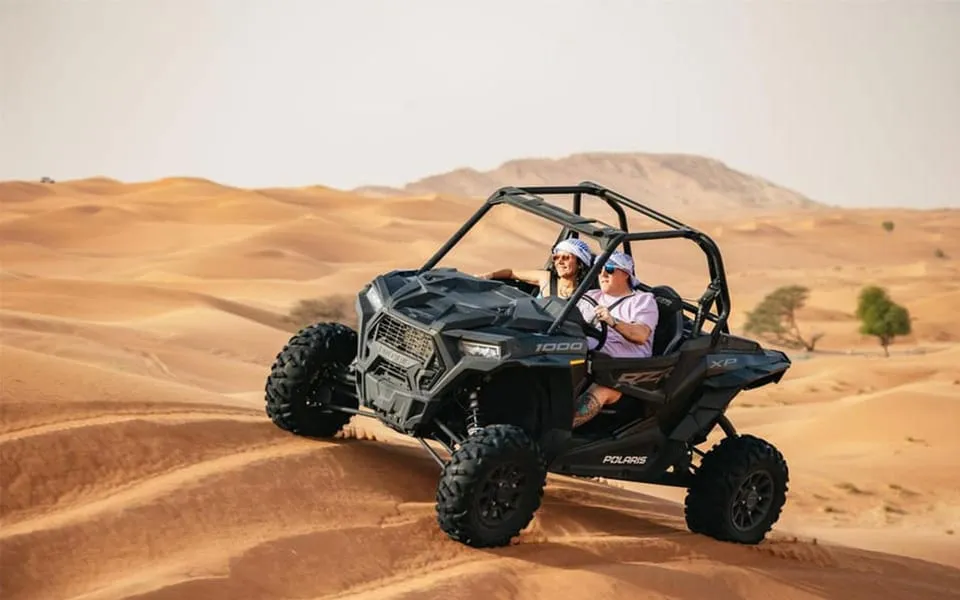 Dubai: Quad Bike, Dune Buggy, and Sandboarding Experience - Image 1