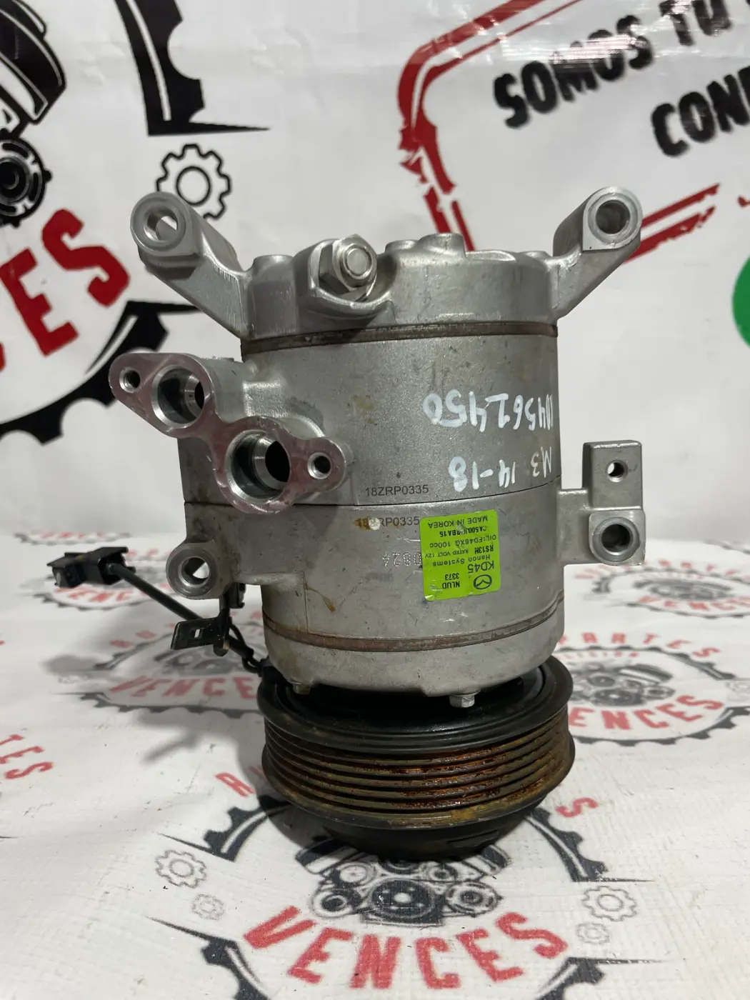 COMPRESOR DE A/C DELANTERO MAZDA M3 14-18. Fotografía 1