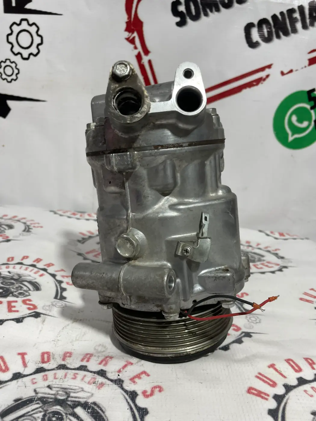 COMPRESOR DE A/C DELANTERO RENAULT DUSTER 12-20. Fotografía 1