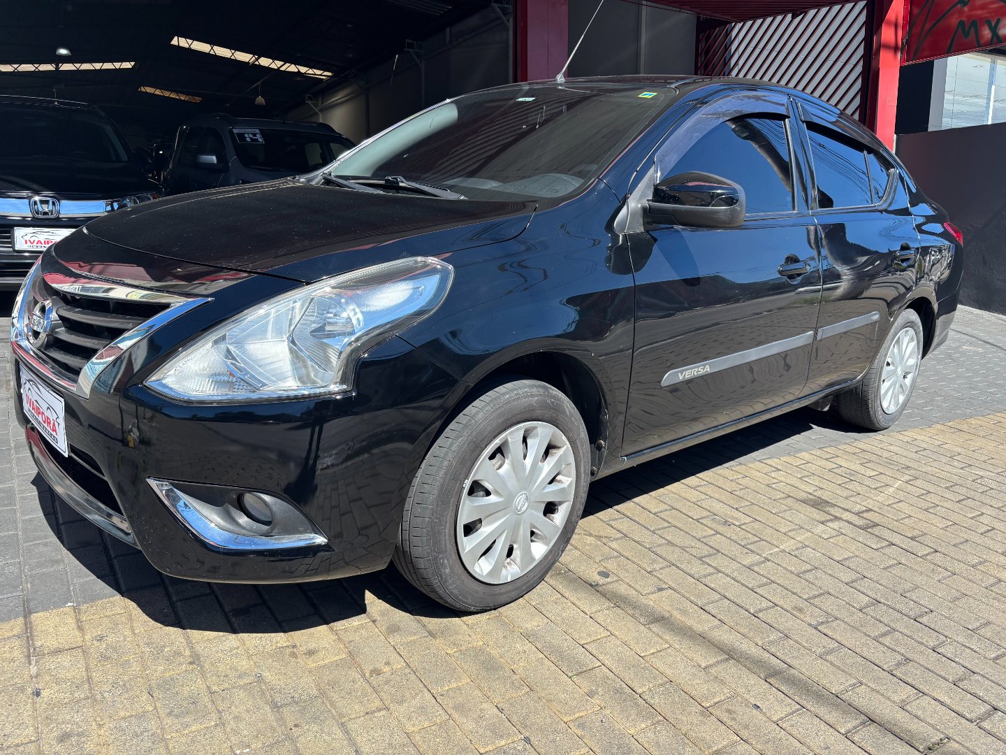 Nissan VERSA 1.0 12V FlexStart 4p Mec. — foto 2