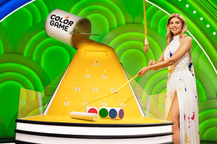 color-game-bonanza-host-releases-the-dice-onto-the-track