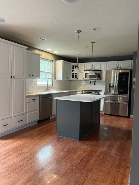 Cabinet Painting and Laminate Refinishing