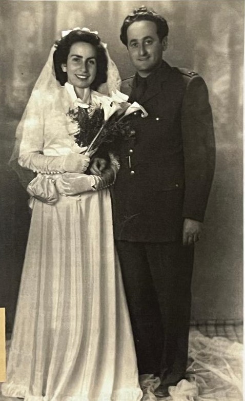 Israel, Rabbi Dr. Zvi and Malka (Bodner) Asaria Helfgott on their wedding day, 23 May 1950.
Born as Hermann Helfgott in Beodra (today Novo Miloševo in Banat), Zvi Asaria was a former prisoner of war in Oflag VI C Osnabrück and later became an important figure in Jewish life and German-Israeli relations.
