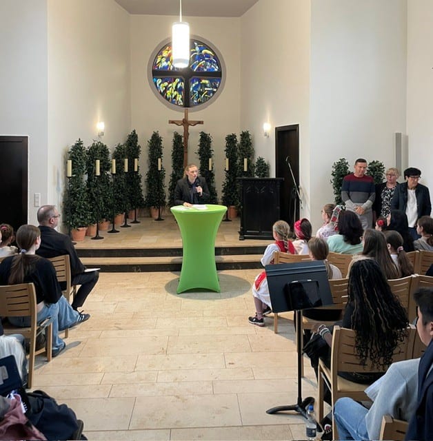 The commemorative programme in the cemetery chapel