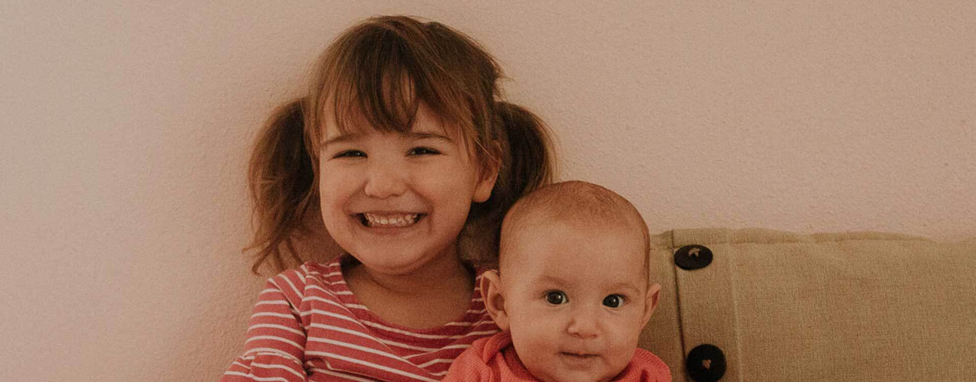 Girl and infant