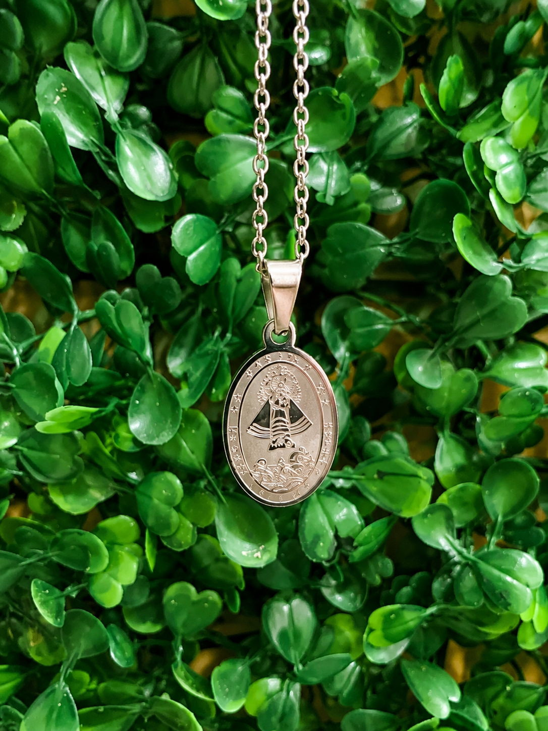 imagen de COLGANTE CARIDAD DEL COBRE