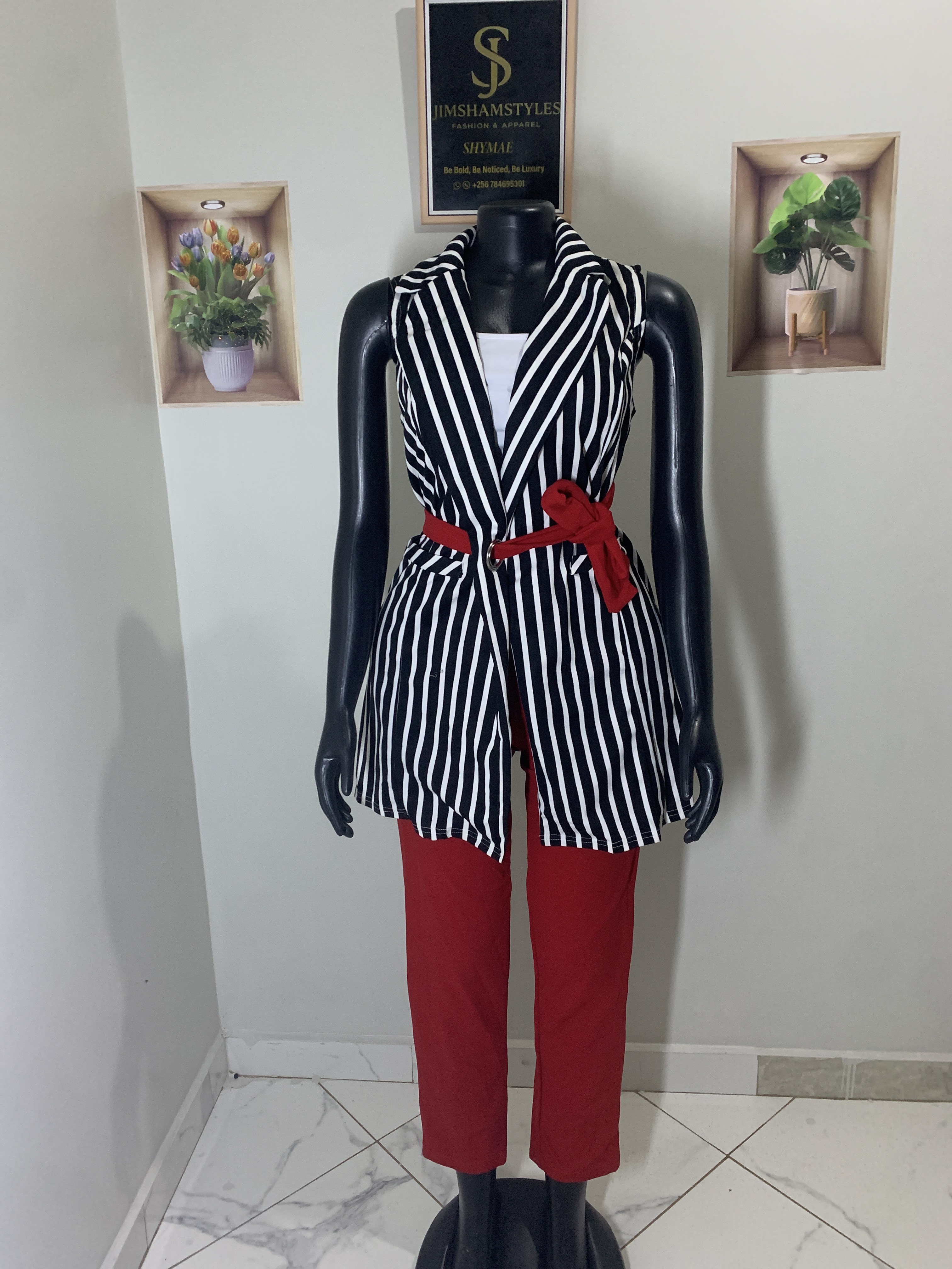 Striped Sleevless blazer/trench coat with a vest paired with plain solid red trousers. (3piece) 