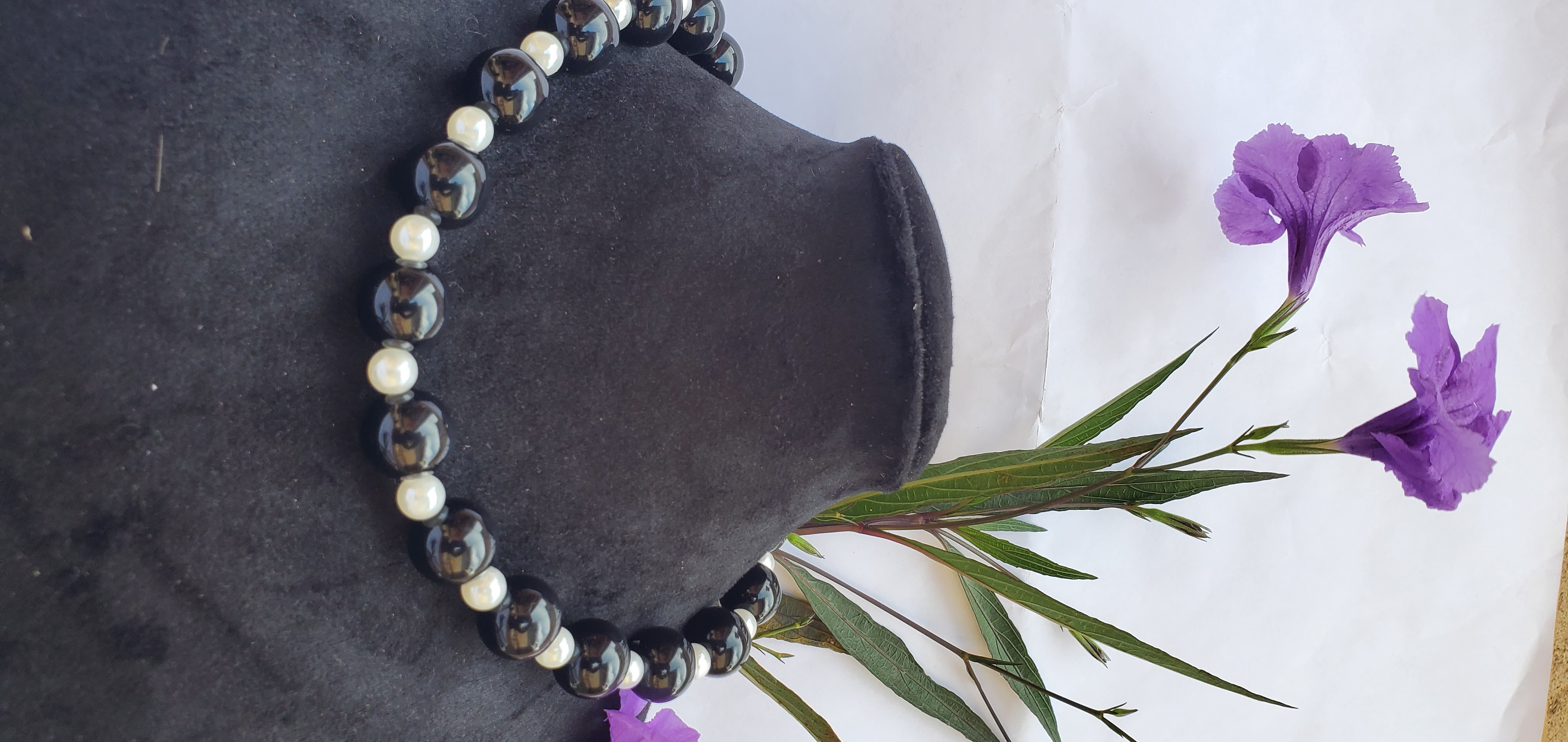 black and cream necklace.