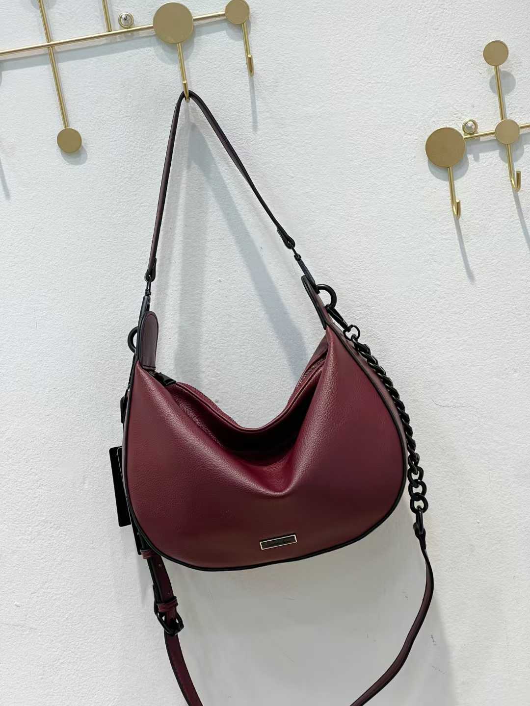 Sleek deep-wine colored hand bag 