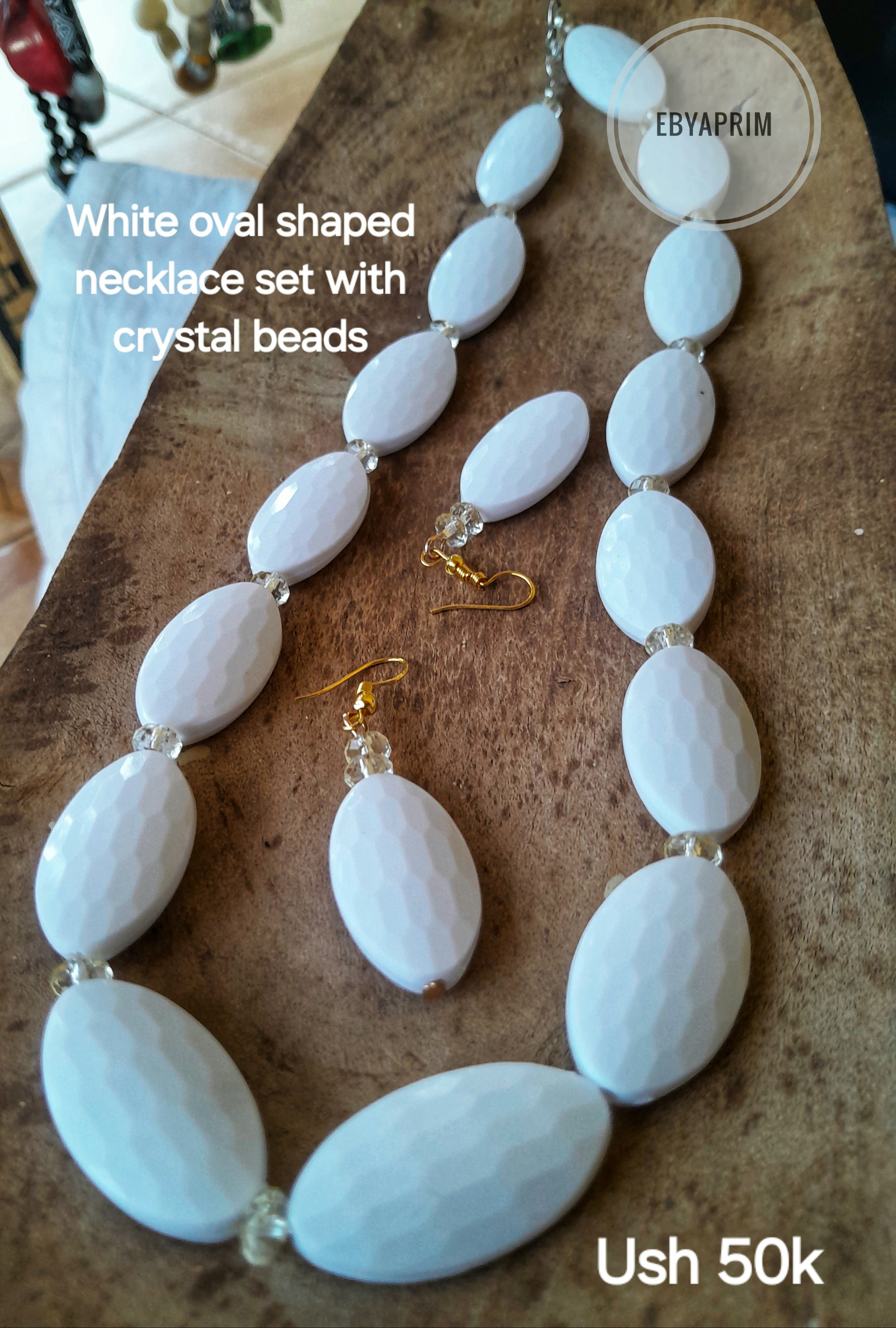 White oval with crystal bead necklace 
