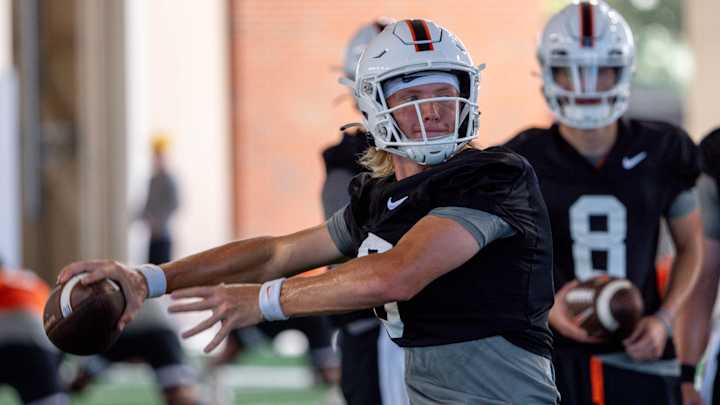 Cowboys' Road Clash Against Oregon Could Shape QB Battle