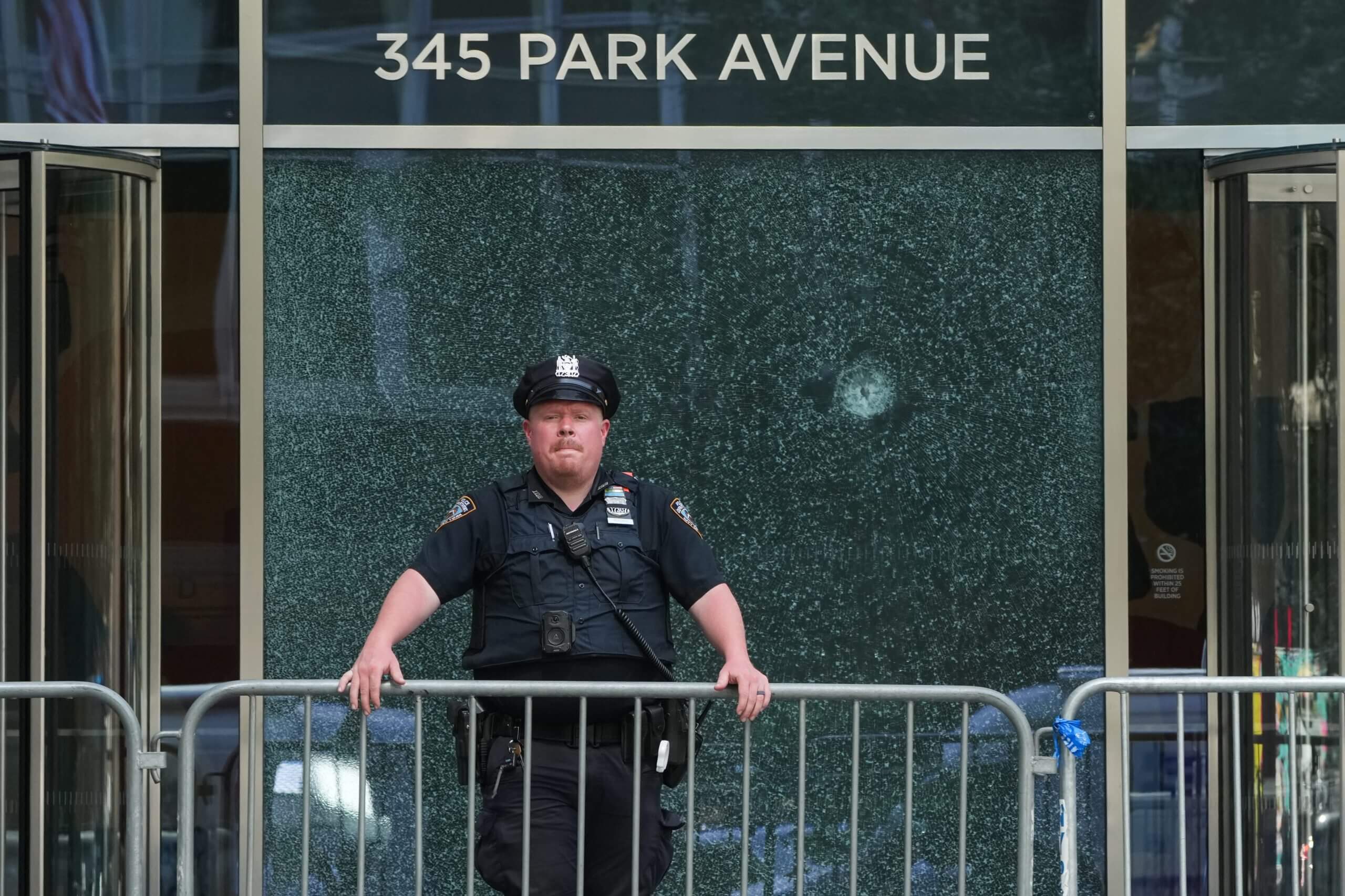 At site of the NYC shooting, loss is signified by bullet holes and food truck orders