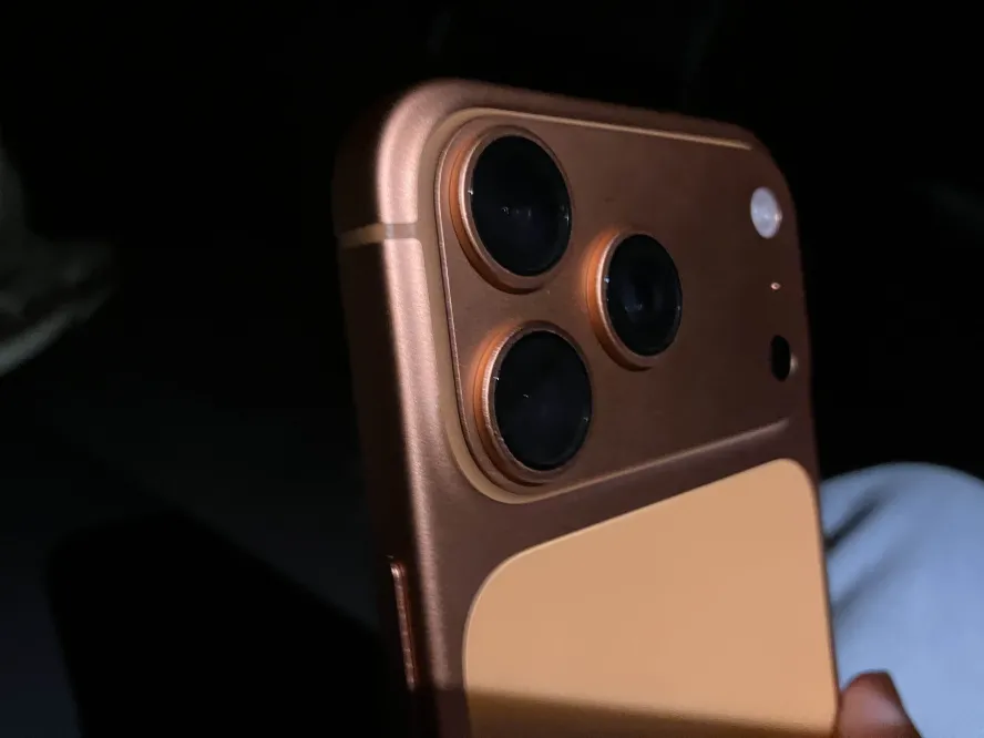 Close-up of three rear smartphone camera lenses