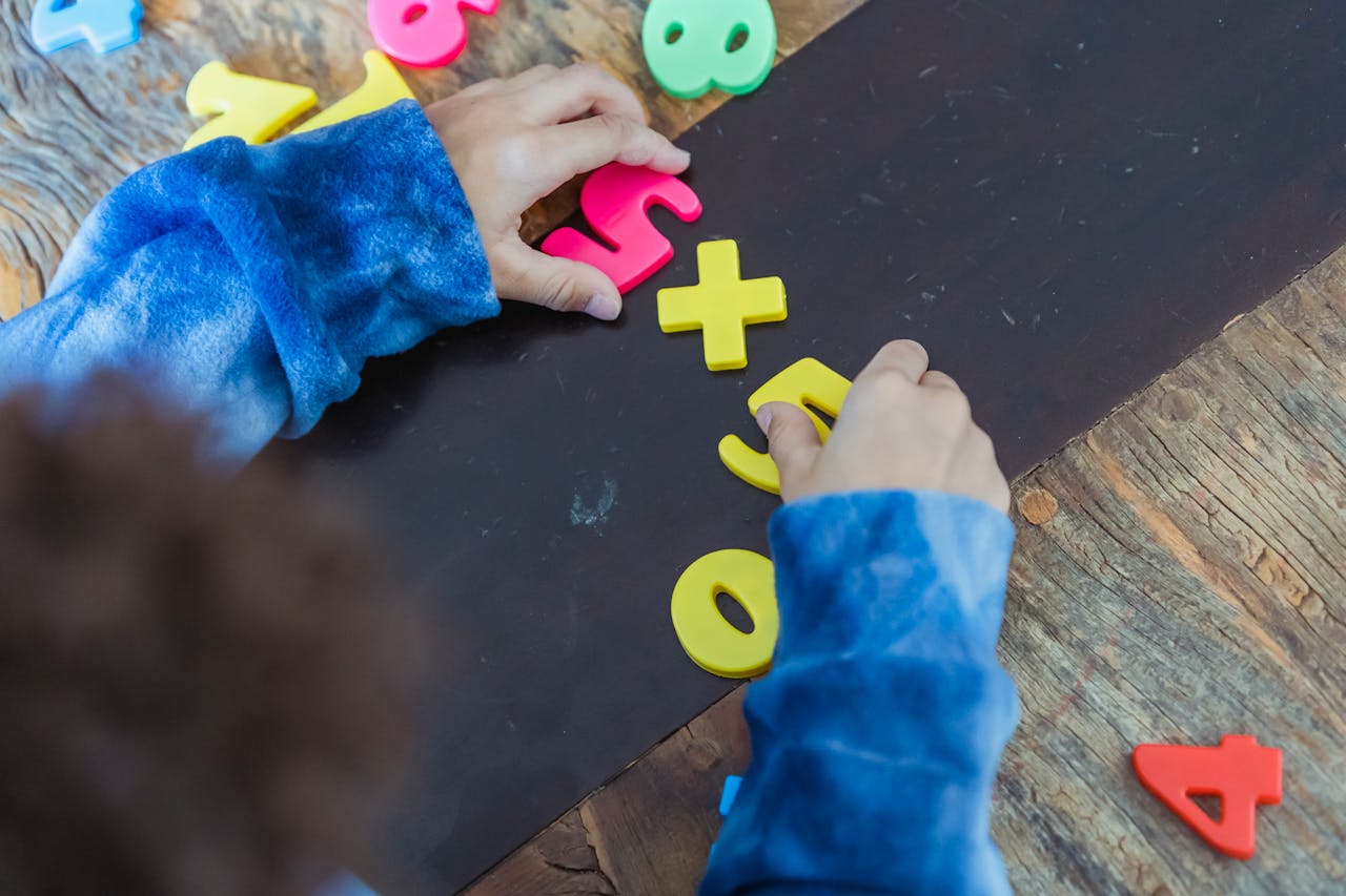 kid playing with numbers