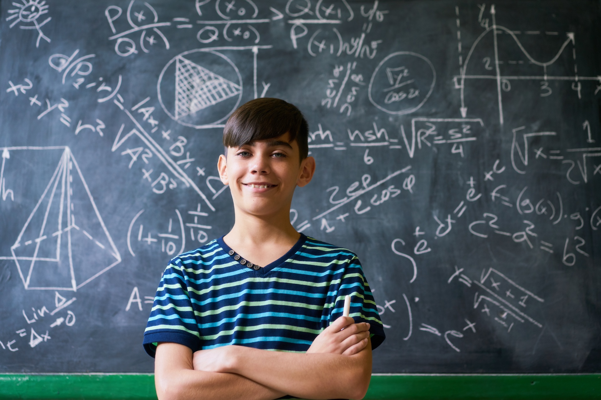 Kid at Chalkboard