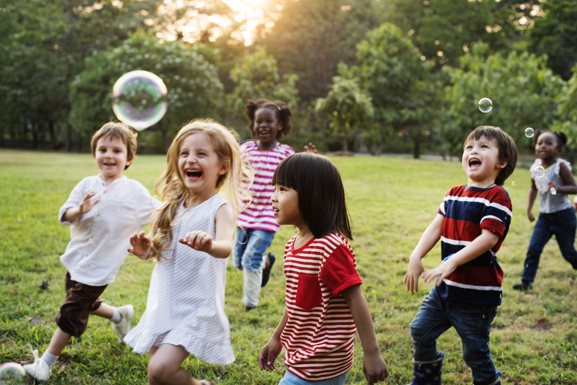 Kids playing in the grass