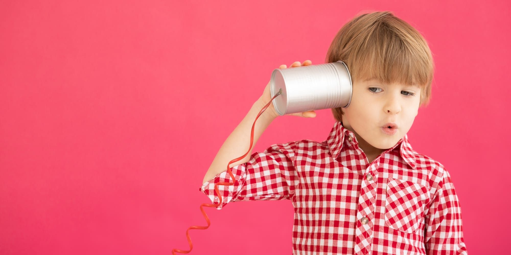 kid with soup can telephone