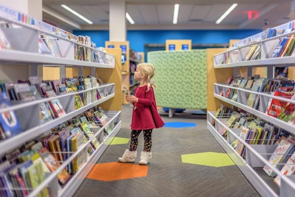 child looking at book